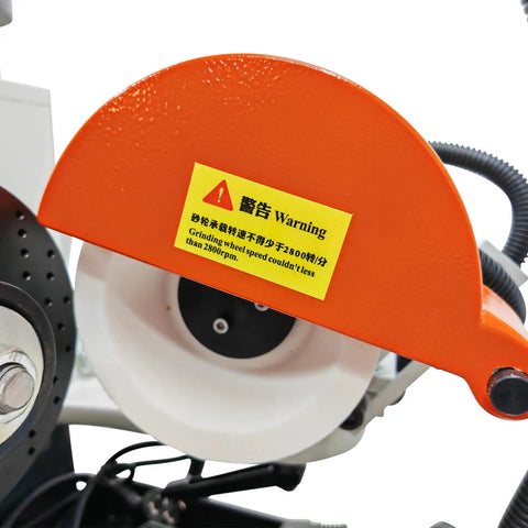Close-up of warning label on Killer Universal Tool Grinding Machine With 360 Degree Swivel Head And Slick Sharpening Action For Shop Floor Metal Blades Running At 2800 RPM Zero Hassle Works Great.