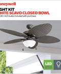 Inland Breeze Tropical 52 Inch Indoor Outdoor Ceiling Fan With Light shown with five blades and bronze finish in modern room.