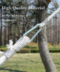 Tree Swing Straps And Hammock Rope Kit, 13 Ft Each With Heavy Duty Carabiner Hooks shown installed on tree outdoors