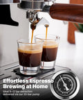 Badass 20 Bar Espresso Machine With Built In Anti Static Grinder And 45 Precision Grind Settings pouring espresso shots into two glasses.