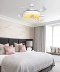 42 Inch Retractable Ceiling Fan With Lights And Bluetooth Speaker in bedroom with hidden blades, modern design.