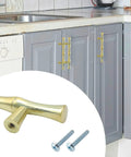 Installed Bamboo Shape Zinc Alloy Drawer Pulls in Brushed Gold Finish 4.96 Inch Length 3 Inch Center, with screws, on gray cabinets