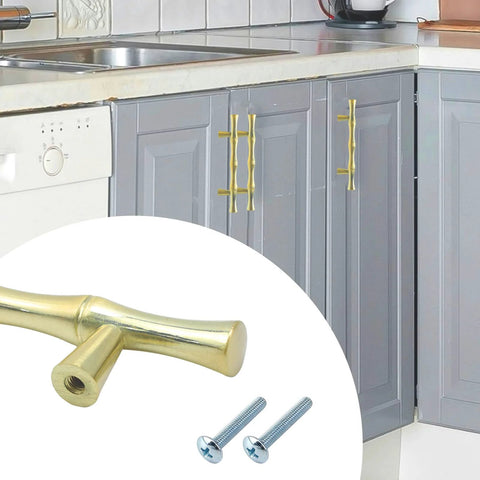 Installed Bamboo Shape Zinc Alloy Drawer Pulls in Brushed Gold Finish 4.96 Inch Length 3 Inch Center, with screws, on gray cabinets