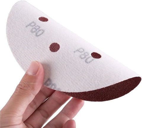 Six Inch 150 Mm Sanding Discs With Hook And Loop Aluminum Oxide Grits From 60 To 2000 For Orbital Sanders shown being held.