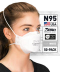 Woman wearing NIOSH Approved N95 Respirator Mask Made in USA Tri-Fold Cup Style With Fish Design And Headband Closure