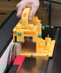 GRR-RIPPER Advanced 3D Pushblock With Handle Bridge Kit on table saw, guiding a wood piece with safety precision.