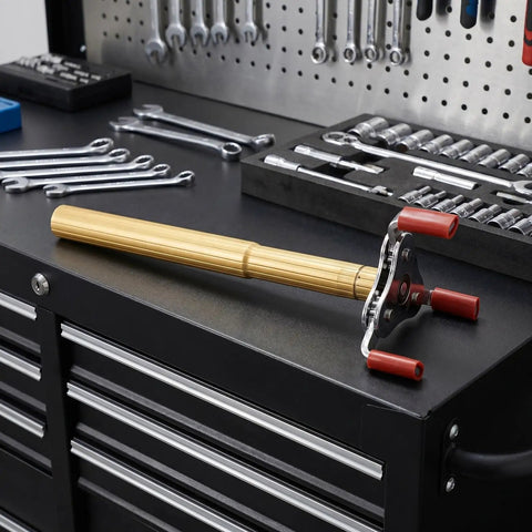 Slick Grip Smoke Sensor Removal Tool For High Ceilings Makes Replacement Dead Simple With Tough Aluminum Alloy Build on workbench with tools.