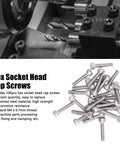 Heavy Duty M4 X 0.7Mm Hex Socket Head Cap Screws 100 Pcs Galvanized Steel Fastener Kit, shown with machinery background, ideal for repairs.