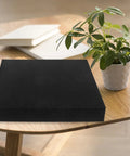High Density Foam Inserts For Packaging And Tool Boxes That Stand Up To Deformation on a wooden table with a plant