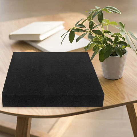 High Density Foam Inserts For Packaging And Tool Boxes That Stand Up To Deformation on a wooden table with a plant