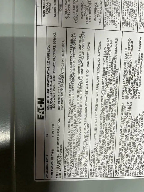 Close-up of Eaton label on 100A panel from Generator Interlock Kit With Electric Start For 100 Amp Panels Compatible With Siemens Eaton Or ITE Billet Aluminum Made In USA Includes Installation Instructions Mounting Hardware Drill Bit And Panel Stickers.