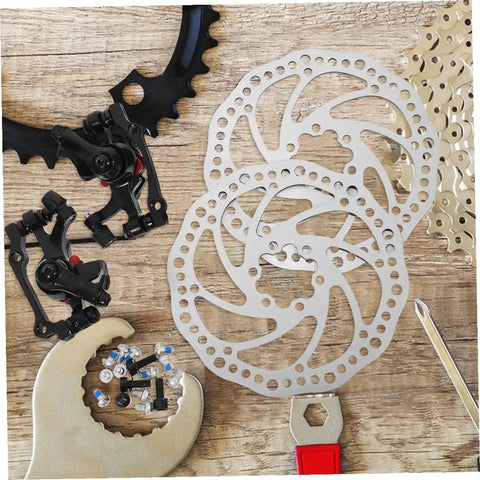 Top Notch Mechanical Disc Brake Kit For Mountain Bike With Front And Rear Rotors And Dual Knob Aluminum Calipers In Silver on wooden surface.