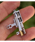 Close-up of 11.5mm Stroke Linear Actuator with 5mm Planetary Gearbox, shown on hand for scale; ideal for robotics and DIY projects