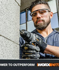 Man using Power Share 20V Cordless Hammer Drill With Brushless Motor 1/2 In Heavy-Duty Chuck on concrete wall