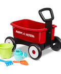 Red push and pull walker wagon with garden tools for kids one to four years old, includes bucket, rake, and watering can.