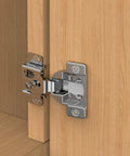 30 Pack Face Frame Cabinet Hinges With Soft Close Gliding Action And Half Inch Overlay mounted on a wooden cabinet.