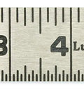 Close-up of One And A Quarter Inch Steel Measuring Rule 3 Foot Long With Bold Deeply Etched Black Markings for woodwork accuracy