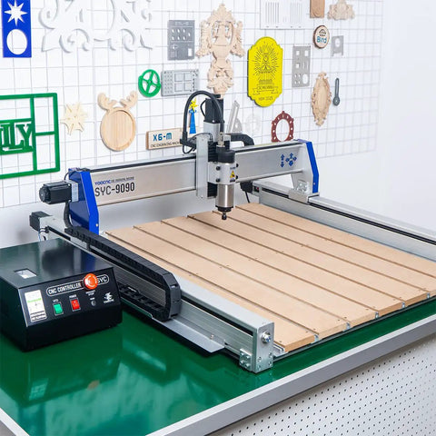 Shop Ready Heavy Duty 4 Axis 9090 Cnc Router For Wood Engraving Milling Drilling Machine on green worktable with control panel.