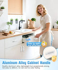 Woman in kitchen using 5.7 Inch Self Adhesive Aluminum Cabinet Handle Set Of 2 on white cupboard