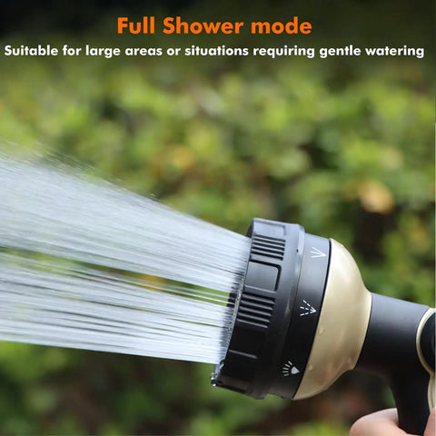 Close-up of heavy duty metal hose nozzle with 8 spray patterns in full shower mode, bronze finish, for gentle watering