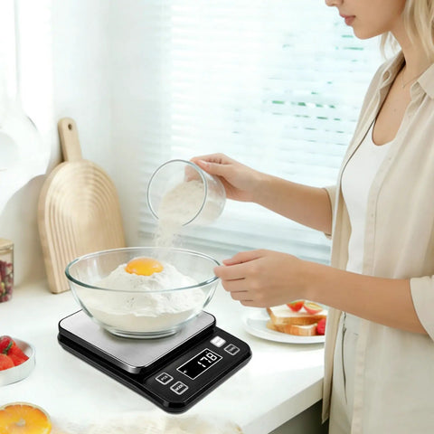 Woman baking using Waterproof Pro Grade Digital Kitchen Scale With IP67 Rating 10Kg Capacity 0.1g Precision Type C Rechargeable 304 Stainless Steel Platform
