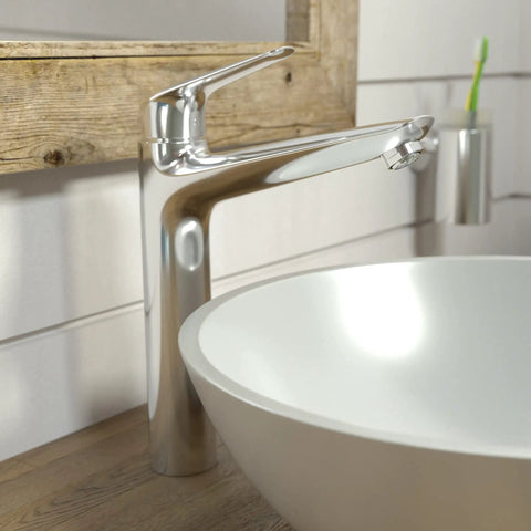 Low Flow Single Handle Tall Bathroom Sink Faucet Chrome Water Saving Modern Design 3 Hole Compatible Or Single Hole Install No Fuss Easy Clean Durable Build Model 71124001 beside a white basin