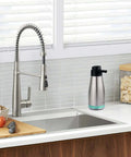 Stainless Steel Liquid Soap Dispenser 15 Fl Oz For Dish And Hand Soap No Fuss Pump Top Lifts Off For Easy Refill next to kitchen sink