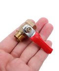 Tough As Nails Four Inch Mini Ball Valve With Slick Lever Handle shown in hand for quick garden hose setup.