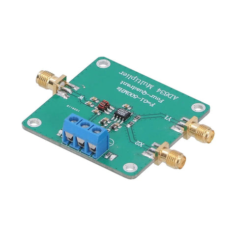 Four Quadrant RF Multiplier Mixer Module showing AD834 components, green PCB, and connectors for signal processing and test equipment.