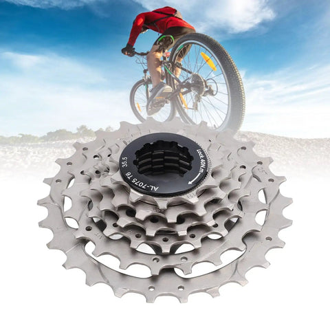 6 Speed Bicycle Cassette With Low Noise And Smooth Rotation, Durable Stainless Steel And Aluminum Alloy Gear Set, cyclist in the background