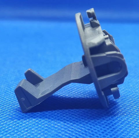 Side view of Washer Lid Strike Replacement W11457841, heavy duty door strike lock in dark gray for top load washers.