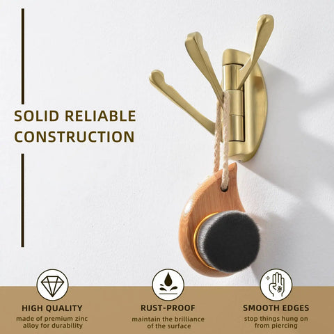 Three Arm Brushed Gold Folding Swivel Towel Hook Space Saving Metal Towel Holder For Bathroom Robe And Coat Also Perfect RV Organizer Screw Mount Smooth Fold Easy Install No Closet Needed showing solid reliable construction with attached brush accessory.