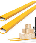 Angled view of yellow 92-inch forklift pallet fork extensions, 4.5-in width, pair for 4-in forks