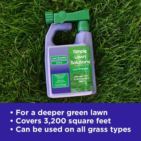 Heavy Duty Liquid Lawn Fertilizer With Iron And Nitrogen, 32 Ounce bottle with hose end sprayer, on grass surface.