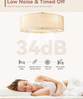 Low Profile Ceiling Fan With Light 20 Inch Boho Rattan Flush Mount Drum Cage 6 Speeds With Remote Control above a sleeping woman.