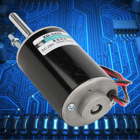 Heavy Hitter 30W Brushed DC Motor With Reversible CW CCW Spin And Serious Torque Making It A Dope Pick For Quiet Weekend DIY Robot Projects Running On 12 Or 24 Volts visible with wiring against electronic circuit background.