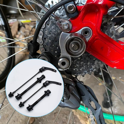 Quick Release Bicycle Axle Kit For Mountain Bikes Front And Rear Hollow Hubs With Steel Axles Black Set next to red bike hub