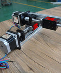Kickass Xy Linear Motion Stage Featuring 500Mm X And 300Mm Y Stroke Ball Screw Guide Table with NEMA 23 steppers on a wooden surface.