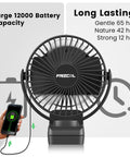 Portable USB Clip On Fan With 12000mAh Battery And 65 Hours Runtime showing large battery and charging with phone