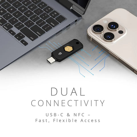 Zero Drama Dual Mode Usb C Security Key With Nfc Tap Feature For Seamless Passwordless Login Supports Fido2 Protocols And Modern Passkeys Across Every Device You Own Keychain Ready next to a laptop and smartphone.