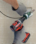 Person using Snapper Shear Pro Drill Attachment For Fiber Cement Board Cutting HardieBacker One Quarter To One Half Inch Thick With Any 18 Volt Or Higher Cordless Drill Contractor Grade For Cutting Any Shape on a cement board