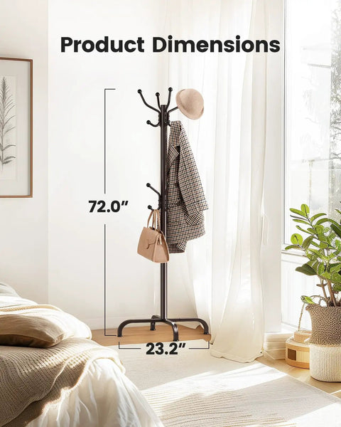 14 Hook Freestanding Coat Rack Stand For Entryway Hallway Bedroom And Office Metal Coat Tree Hat Rack For Coats Hats Bags Space Saving Storage In Rich Brown Finish shown in bedroom corner by window.