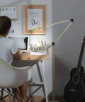 Sage 2 In 1 LED Craft Table And Floor Lamp Adjustable Floor Reading Light in living room with guitar