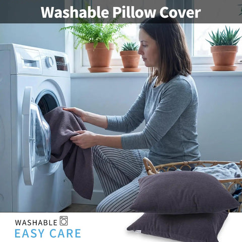 Woman washing Two Pack Camping Pillows With Plush Fill And Washable Covers, Ultra Comfy Compressible Pillows for Hiking, Travel, and Sleep