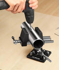Hand drilling pipe clamped in 360 Degree Rotating Bench Vise With Quick Release Ratchet Wrench for woodworking and metalworking projects.