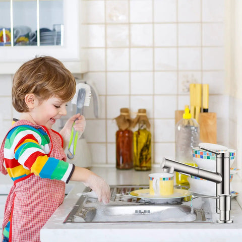Child using built in kitchen sink soap dispenser with 39 inch extension tube, 304 stainless steel pump head, brushed nickel finish.