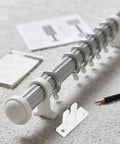 Kick Out Drafts With Heavy Duty Nylon Screen And Window Rollers Featuring Sturdy Guide Blocks For Double Track Sliding Doors Slick Gliding Pulleys Kit components on a carpet.