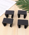 Four Pack Plastic Sectional Sofa Clips For Rattan Furniture, Easy To Remove Chair Fasteners, Black Connectors On Table