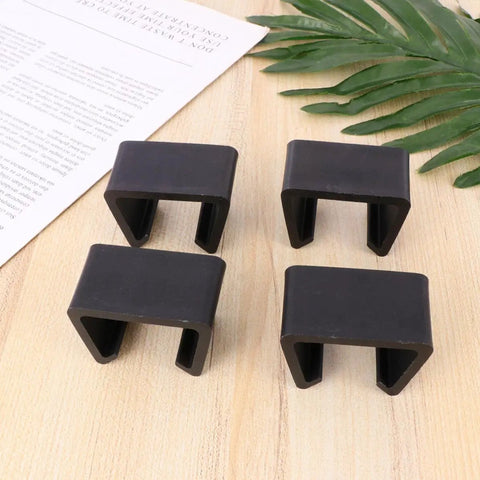 Four Pack Plastic Sectional Sofa Clips For Rattan Furniture, Easy To Remove Chair Fasteners, Black Connectors On Table