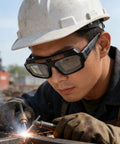 Close-up of a welder wearing Solar Powered Auto Darkening Welding Glasses With Killer Panoramic View And Super Comfy Wraparound Fit.